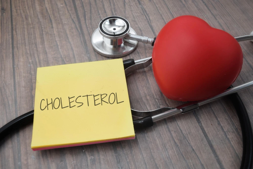Cholesterol wording with a stethoscopes